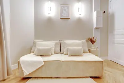 Un ou plusieurs lits dans un hébergement de l'établissement Studio luxueux a Paris with AC a proximite du Marais