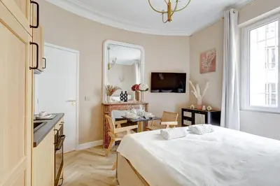 Un ou plusieurs lits dans un hébergement de l'établissement Appartment haut de gamme en plein coeur de Paris