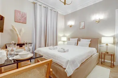 Un ou plusieurs lits dans un hébergement de l'établissement Appartment haut de gamme en plein coeur de Paris