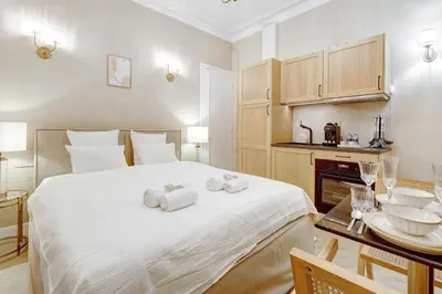 Un ou plusieurs lits dans un hébergement de l'établissement Appartment haut de gamme en plein coeur de Paris