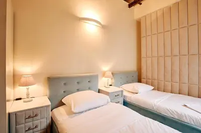 Un ou plusieurs lits dans un hébergement de l'établissement Spacious flat - Champs Elysées