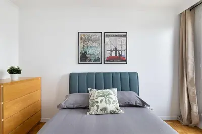 Un ou plusieurs lits dans un hébergement de l'établissement Lovely Appartement-2rooms-6p sunshine-quiet-subway
