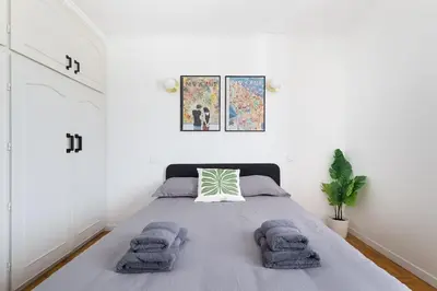 Un ou plusieurs lits dans un hébergement de l'établissement Lovely Appartement-2rooms-6p sunshine-quiet-subway