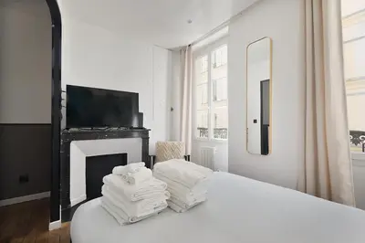 Un ou plusieurs lits dans un hébergement de l'établissement LaSuite Montmartre