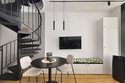 Télévision ou salle de divertissement dans l'établissement LaSuite Montmartre