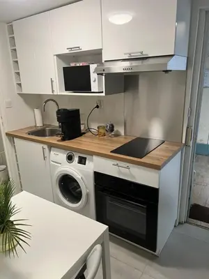 Cuisine ou kitchenette dans l'établissement Île des Caraïbes
