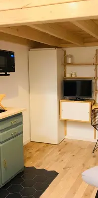 Cuisine ou kitchenette dans l'établissement Studio à 2 pas du Moulin Rouge