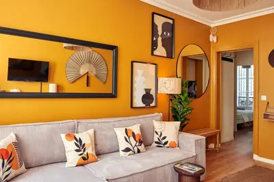 Coin salon dans l'établissement Lovely flat Marais - Orange