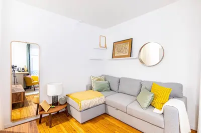 Coin salon dans l'établissement GuestReady - Peaceful Retreat in Batignolles