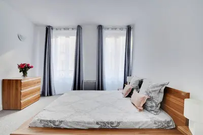 Un ou plusieurs lits dans un hébergement de l'établissement Bastille - Marais Apartment