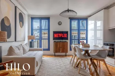 Coin salon dans l'établissement Suite Paris Zola by HILO Collection - 4 people - 35m2