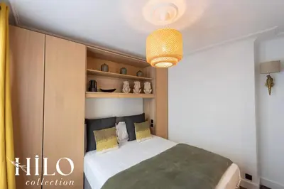 Un ou plusieurs lits dans un hébergement de l'établissement Suite Paris Stendhal by HILO Collection - 6people - 70m2