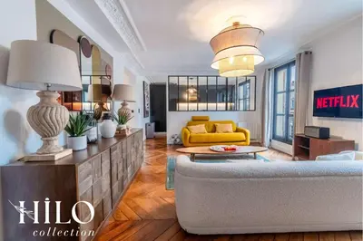 Coin salon dans l'établissement Suite Paris Stendhal by HILO Collection - 6people - 70m2