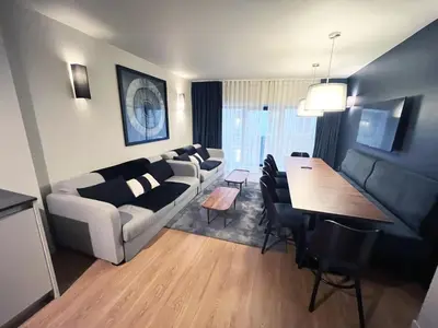 Coin salon dans l'établissement Urban Flat 133 - Ponceau 4 Bedroom Apartment