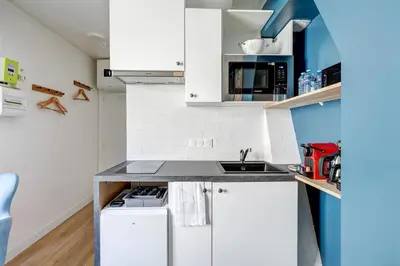 Cuisine ou kitchenette dans l'établissement Le Reve Parisien a Montorgueil