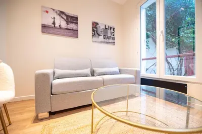 Coin salon dans l'établissement 1 BR Saint Germain Luxembourg Garden