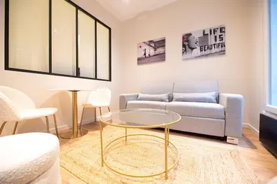 Coin salon dans l'établissement 1 BR Saint Germain Luxembourg Garden
