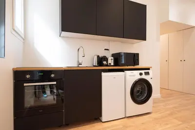 Cuisine ou kitchenette dans l'établissement 1 BR Saint Germain Luxembourg Garden