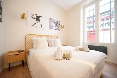 Un ou plusieurs lits dans un hébergement de l'établissement 1 BR Saint Germain Luxembourg Garden