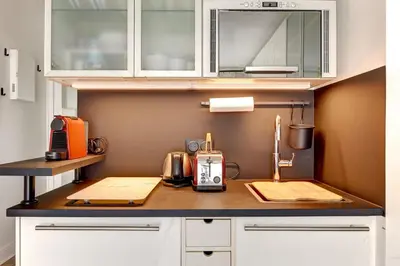 Cuisine ou kitchenette dans l'établissement BM-2Person cosy avec terrasse