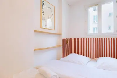 Un ou plusieurs lits dans un hébergement de l'établissement Flexliving - Beautiful 3-room apartment with living room - 18th