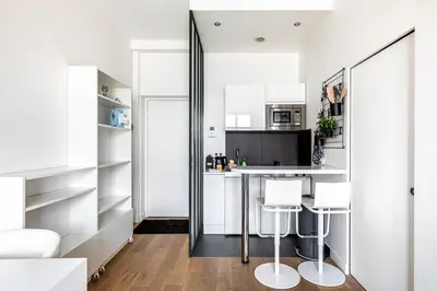Cuisine ou kitchenette dans l'établissement Studio Bastille