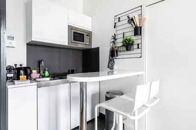 Cuisine ou kitchenette dans l'établissement Studio Bastille