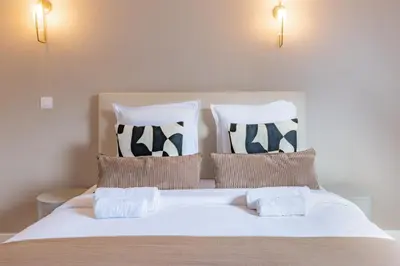 Un ou plusieurs lits dans un hébergement de l'établissement Confort & élégance - Appartement 3BR climatisé