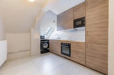 Cuisine ou kitchenette dans l'établissement Confort & élégance - Appartement 3BR climatisé