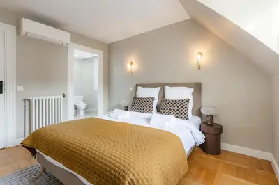 Un ou plusieurs lits dans un hébergement de l'établissement Confort & élégance - Appartement 3BR climatisé