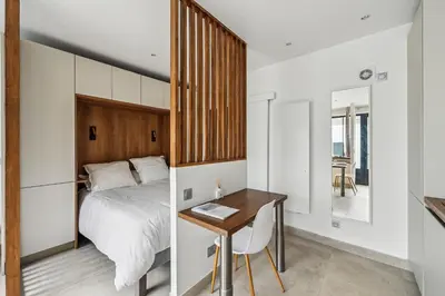 Un ou plusieurs lits dans un hébergement de l'établissement Le Studio Scandinave - 25min de Paris
