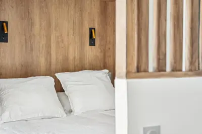 Un ou plusieurs lits dans un hébergement de l'établissement Le Studio Scandinave - 25min de Paris