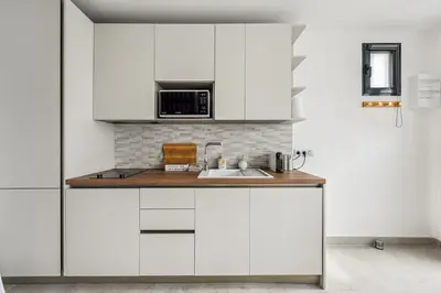 Cuisine ou kitchenette dans l'établissement Le Studio Scandinave - 25min de Paris