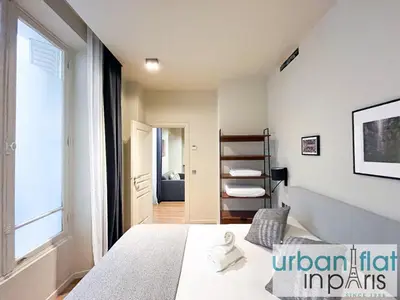 Un ou plusieurs lits dans un hébergement de l'établissement Urban Flat 139 - Duplex Flat Saint-Germain