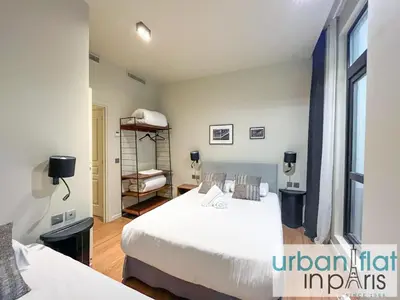 Un ou plusieurs lits dans un hébergement de l'établissement Urban Flat 139 - Duplex Flat Saint-Germain