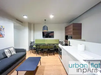 Coin salon dans l'établissement Urban Flat 139 - Duplex Flat Saint-Germain