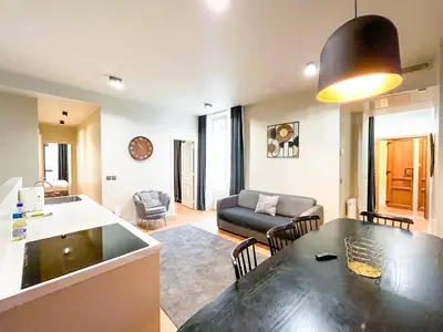 Coin salon dans l'établissement Urban Flat 139 - Duplex Flat Saint-Germain