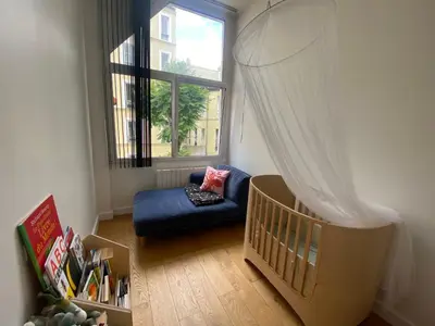 Un ou plusieurs lits dans un hébergement de l'établissement Quiet and bright loft