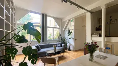 Coin salon dans l'établissement Quiet and bright loft
