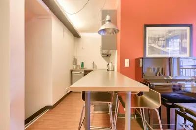 Cuisine ou kitchenette dans l'établissement Stunning 2BR Flat near Place des Vosges