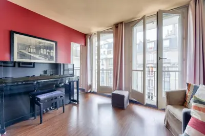 Coin salon dans l'établissement Stunning 2BR Flat near Place des Vosges