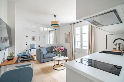 Coin salon dans l'établissement Cozy apartment, center of Paris