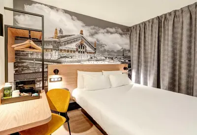 Un ou plusieurs lits dans un hébergement de l'établissement B&B HOTEL Paris Italie Porte de Choisy