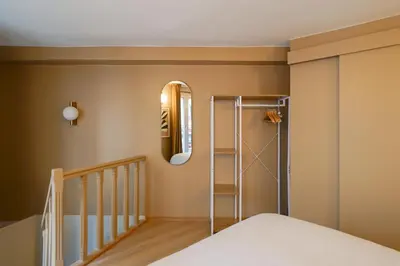 Un ou plusieurs lits dans un hébergement de l'établissement Duplex climatisé - Grands Boulevards