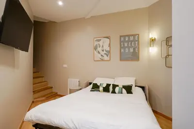 Un ou plusieurs lits dans un hébergement de l'établissement Duplex climatisé - Grands Boulevards