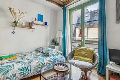 Un ou plusieurs lits dans un hébergement de l'établissement Joli studio grand et calme, Marais