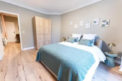 Un ou plusieurs lits dans un hébergement de l'établissement Appartement cosy climatisé 1BR - Gare de Lyon