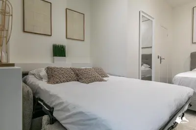 Un ou plusieurs lits dans un hébergement de l'établissement MBA - Splendide Appartement - Proche Nation