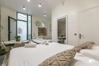 Un ou plusieurs lits dans un hébergement de l'établissement MBA - Splendide Appartement - Proche Nation