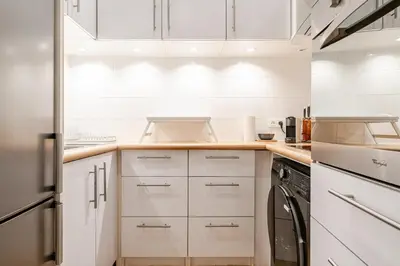 Cuisine ou kitchenette dans l'établissement Montorgueil Suite